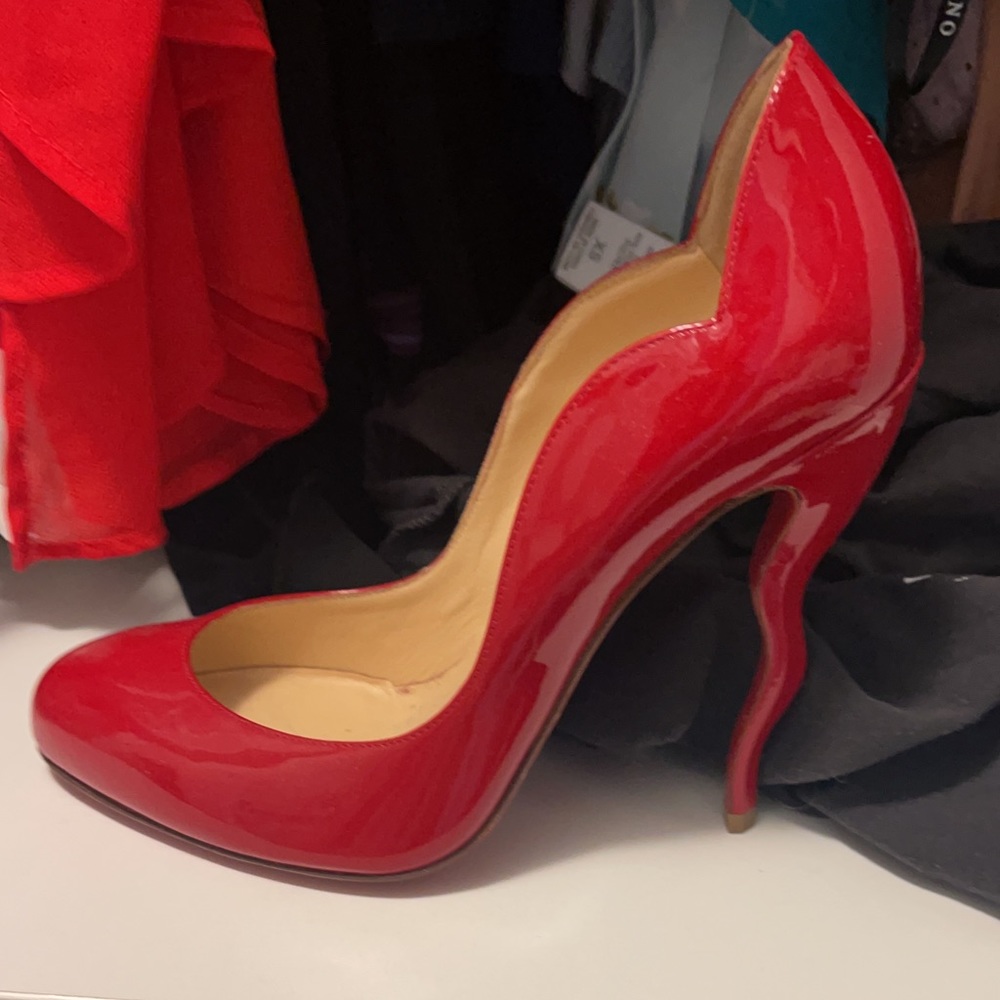 Louboutin woman red shoes